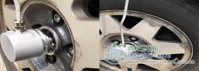 图为编码器测量汽车车轮转速的应用照片